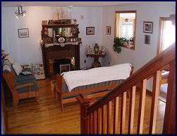 Guests at our inn can relax by the fireplace in the parlour